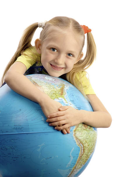 Little Smiling Girl Embracing the Globe  - Foto, afbeelding