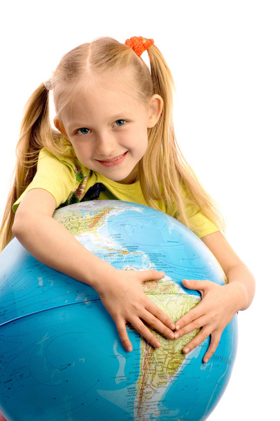 Little smiling girl embracing the earth. - Fotoğraf, Görsel