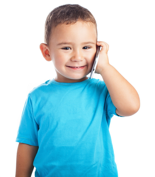 Child calling by mobile - Фото, изображение