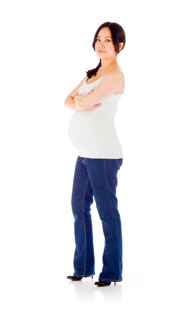Mulher grávida com os braços cruzados
 - Foto, Imagem