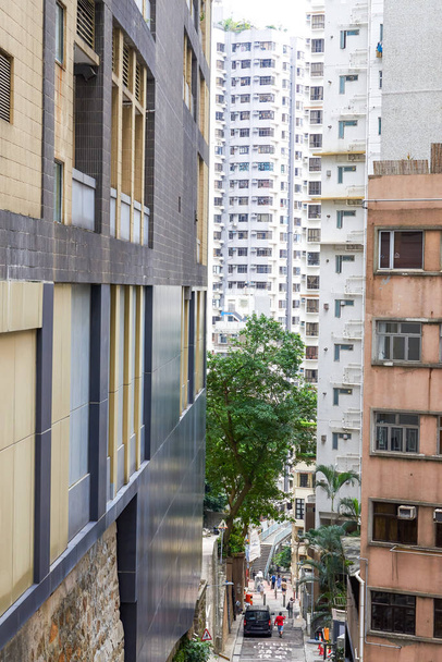 Carreteras bulliciosas y edificios altos en Hong Kong - Foto, imagen