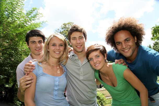 Group of happy students in a park - Foto, Imagen
