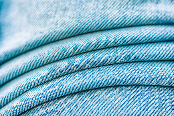 blue jeans texture. Focus in the center of the frame - Fotó, kép