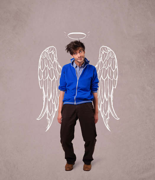 Young man with angel illustrated wings - Fotografie, Obrázek