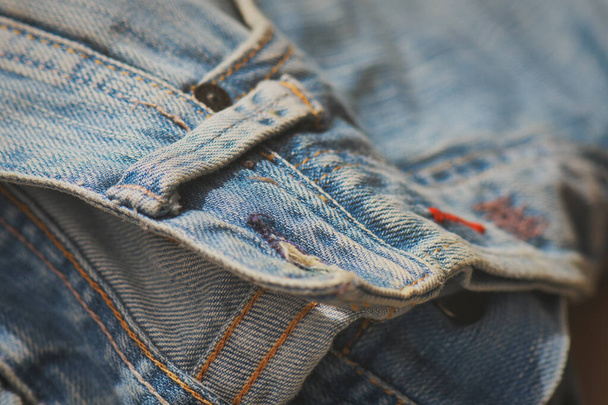 Macro detail van blauwe jeans riem - Foto, afbeelding