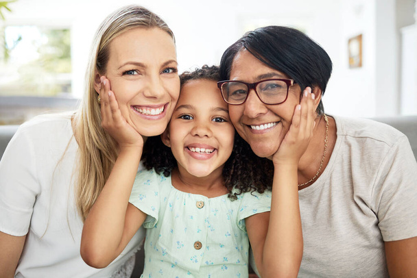 Interracial family, portrait and home with love, bonding and parent care with grandmother, mom and child. Happy, smile and living room with children and support together relax with grandparents. - Photo, Image