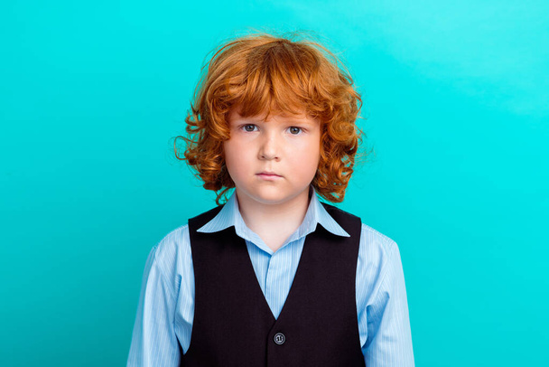 Photo portrait of cute curly ginger boy look camera wear trendy school uniform clothes isolated on aquamarine color background. - 写真・画像