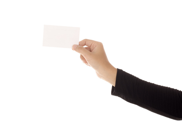 weibliche Hand hält Papierkarte, isoliert auf weißem Hintergrund - Foto, Bild