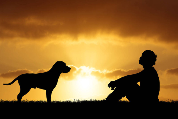 犬は男の親友のコンセプトであり,犬と一緒に絶望的な男のイメージ - 写真・画像