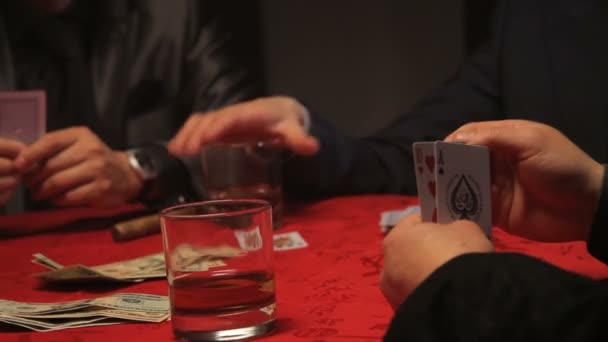 Businessmen and female playing cards - Кадры, видео