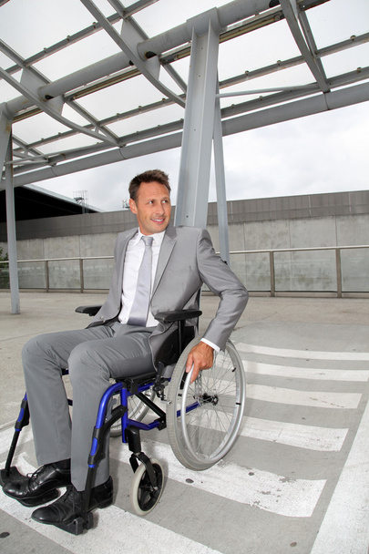 Businessman in wheelchair - Φωτογραφία, εικόνα