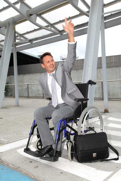 Businessman in wheelchair - Valokuva, kuva