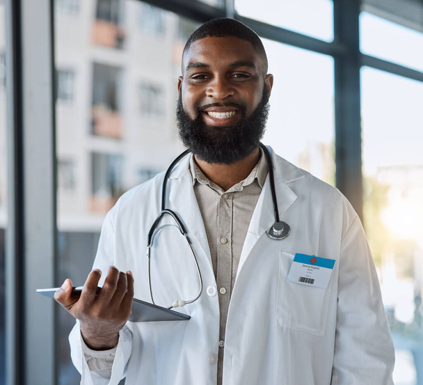Tablet, happy man and portrait of doctor for healthcare services, telehealth analysis or hospital network. African person medical worker with digital technology for planning, clinic research or info. - Photo, image