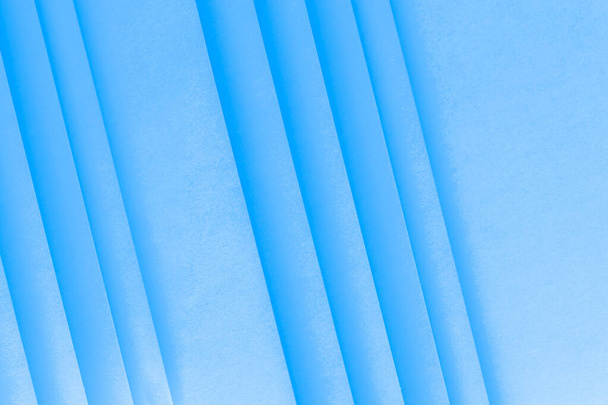 An overhead view of blank paper striped background - Zdjęcie, obraz