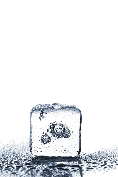 Melting ice cube - Фото, изображение