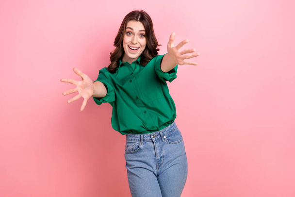 Photo of sweet excited lady wear green shirt open arms ready hug you isolated pink color background. - Zdjęcie, obraz