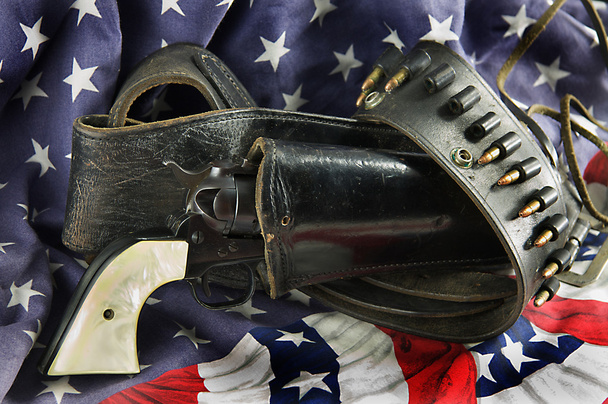 Western Gun in Holster on Flag - Photo, Image