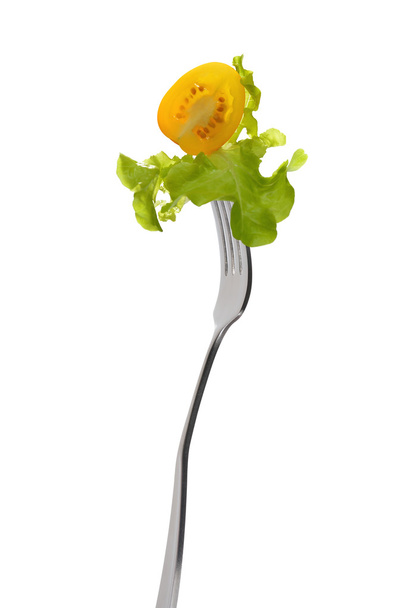 Mixed salad on fork - Foto, immagini