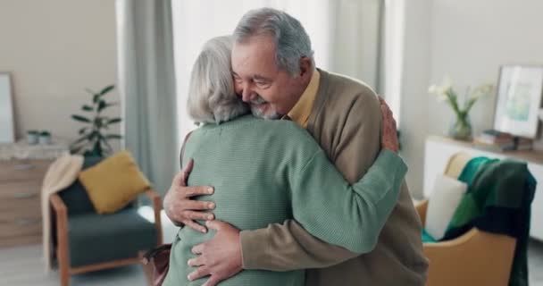 Hug, home and senior couple with love, dance and quality time with retirement, bonding and romance. Romantic, old man and elderly woman embrace, lounge or marriage with relationship, cheerful or move. - Footage, Video