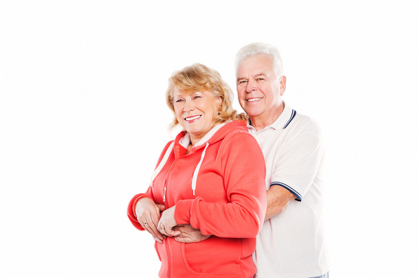 Heureux couple de personnes âgées souriantes amoureux. Isolé sur fond blanc
. - Photo, image