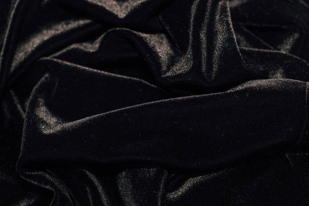 Textura z manšestrové tkaniny z černého veloru se záhyby. - Fotografie, Obrázek