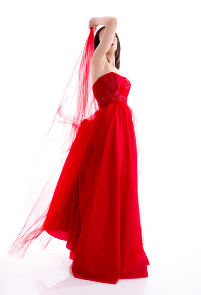Красивая женщина в красном платье - Фото, изображение