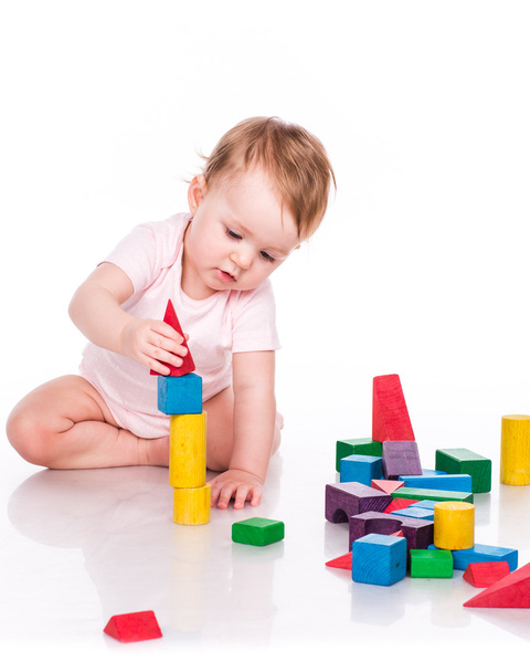 Beautiful baby building with cubes - Фото, изображение
