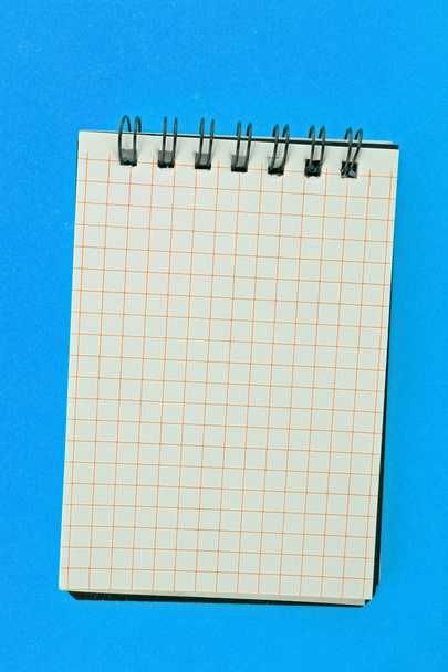 Notebook on the blue background - Foto, Imagem