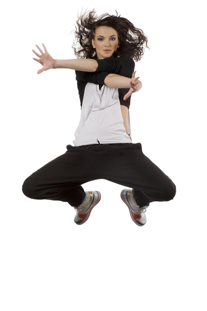Girl hip hop dancer in jump pose - Foto, Imagen