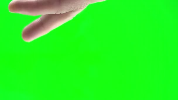 The fingers move along the table towards each other, in slow motion man and a woman play on a green background chroma key go towards each other with fingers fingers go towards each other as people - Imágenes, Vídeo