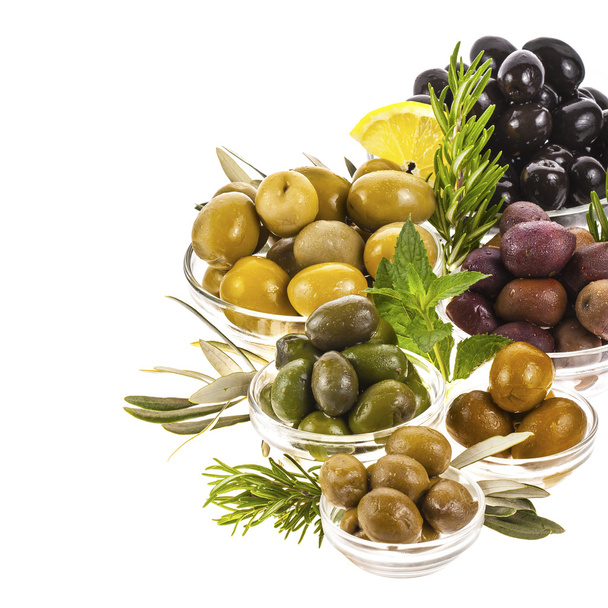 Pickled olives in glass bowls - Fotó, kép