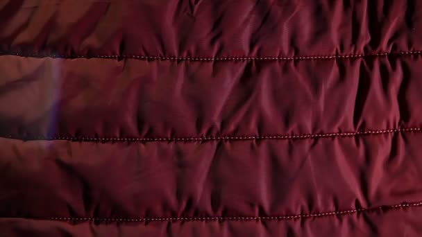 világos narancssárga háttér canvas ráncos szövet kabát téli textúra motion videó - Felvétel, videó
