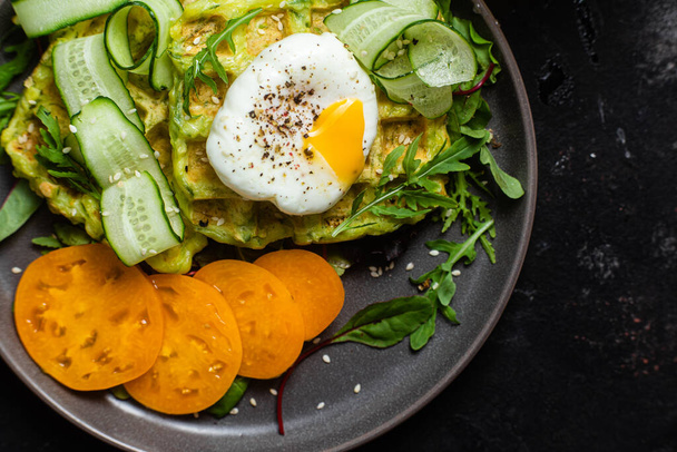 Zucchini waffles with poached egg - Photo, Image