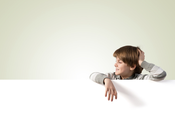 Boy with blank advertising board - Foto, Bild