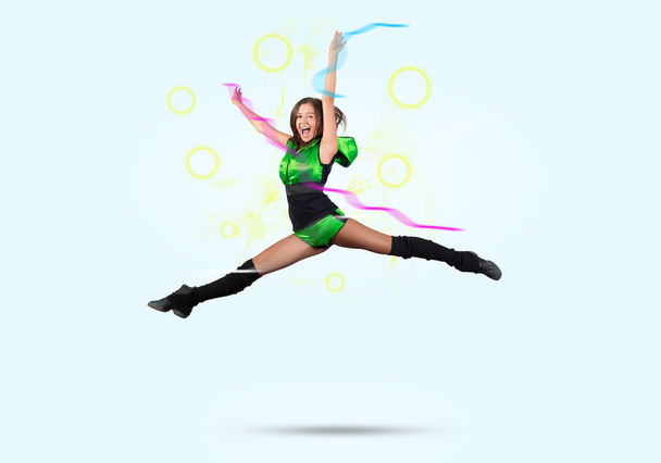 Cheerleader girl jumping high - Фото, зображення