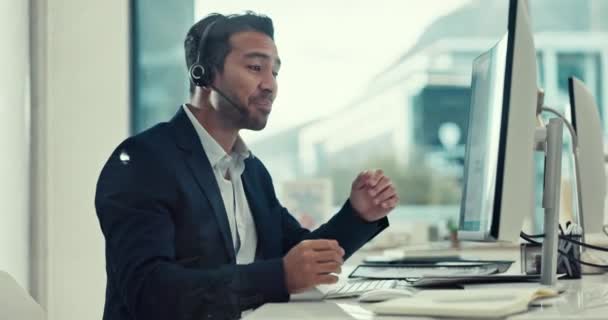 Consulting, online and a man in a call center with a computer for telemarketing and technical support. Smile, contact us and an Asian customer service employee speaking on a consultation for advice. - 映像、動画