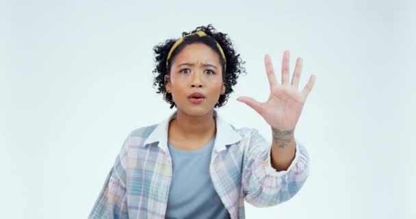 Stop hand, woman face and no finger in studio for warning, order or threat on white background. Protest, palm and portrait of female model with emoji sign for rejection, voice or limit control vote. - Filmati, video