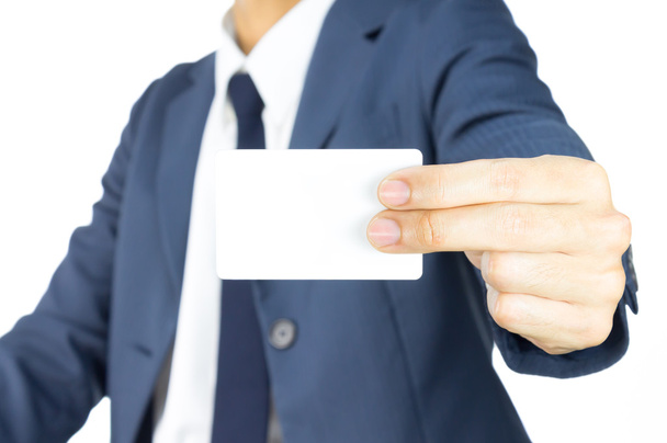 Biznesmen posiadać wizytówkę lub białe karty przez dwóch palców w Si - Zdjęcie, obraz