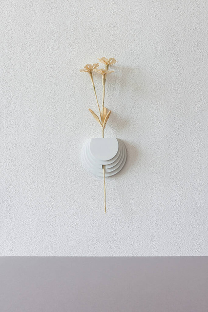 Flowers made from straw on a white background. Straw wall decoration.  - Photo, Image
