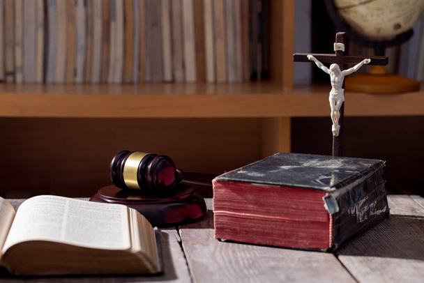 Holy bible book and judge's gavel on table background. Judicial system, constitution, democracy, rule of law. There are no people in the photo. There is free space to insert. - Photo, Image
