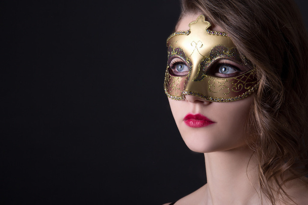 close up portrait of beautiful woman in mask over grey - Photo, image