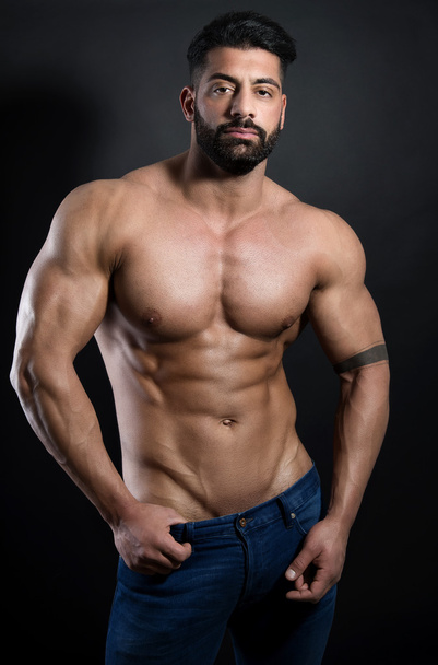 Handsome muscular young bodybuilder - Фото, зображення
