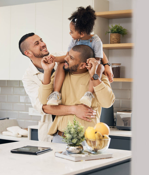 Happy family, child and gay parents in home together with love, support and bonding with girl on shoulders of dad in hug. LGBT, fathers and men with happiness or smile in kitchen and playing with kid. - Fotoğraf, Görsel