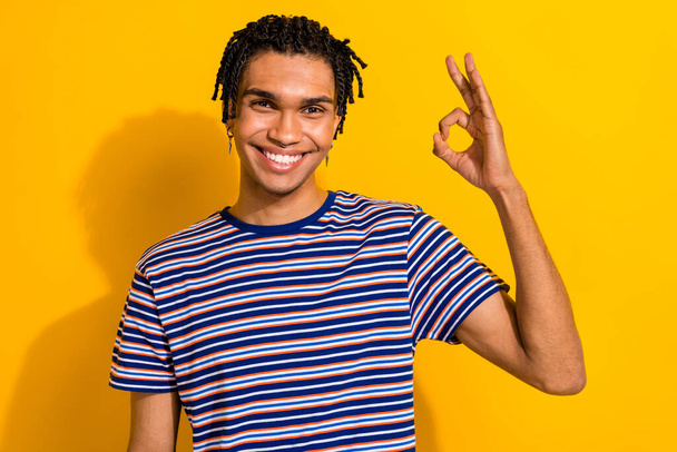 Photo of satisfied cheerful man wear stylish outfit demonstrate cool feedback okey symbol isolated on yellow color background. - Фото, зображення