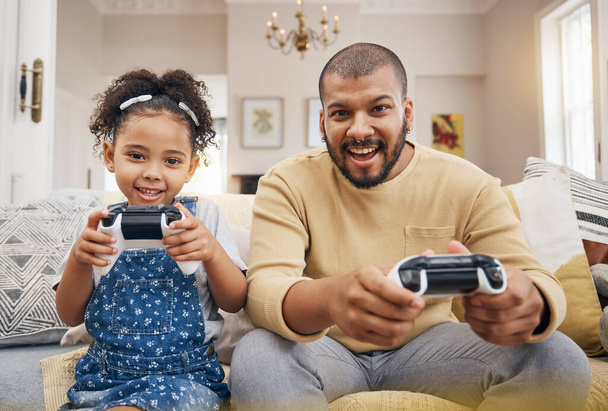 Happy, portrait and a father and child gaming on the sofa for care, bonding or competition. Smile, family and a girl kid playing games with a dad on the home couch together for learning or winning. - Photo, Image