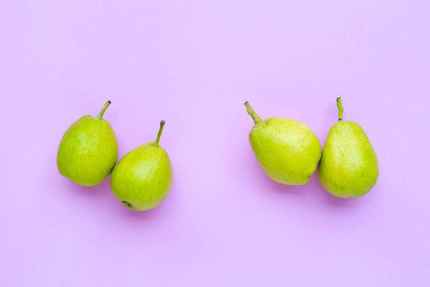 Pear fruits on pink background. - Photo, Image