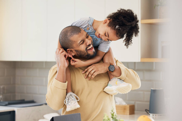 Happy family, hug and father and girl child in a kitchen with piggyback, games and fun, breakfast and laugh at home. Love, smile and parent with kid embrace, playful and bonding in a house on weekend. - Photo, Image