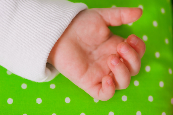Hand of a little baby sleeping - Foto, afbeelding