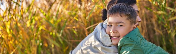 happiness, love, african american boy in autumnal clothes hugging mother, autumn, fall, banner - Fotó, kép