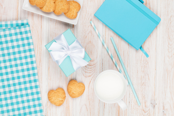 milk,  cookies, gift box and notepad - Foto, Imagen